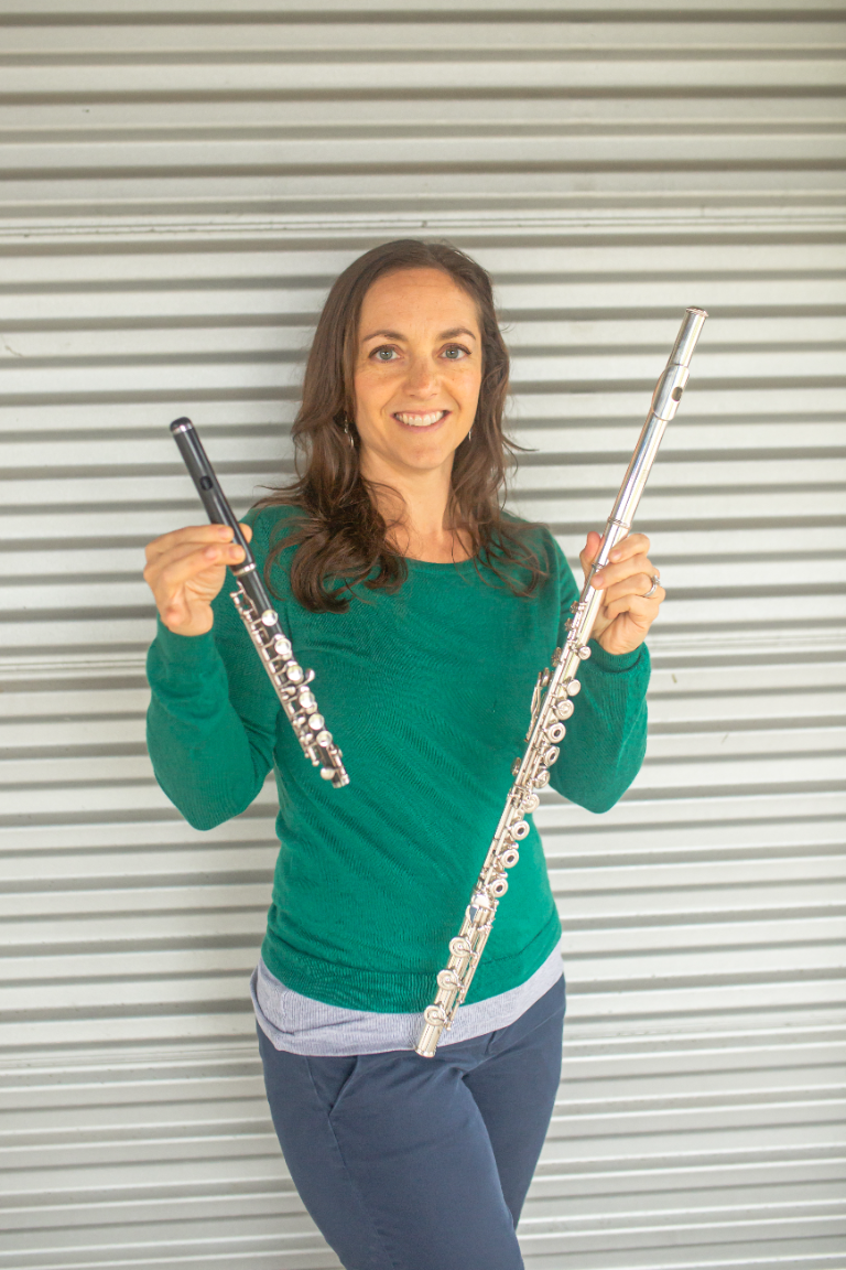 Sarah holding two flutes